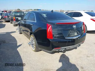 2014 Cadillac ATS Luxury RWD z VIN 1G6AB5RX6E0130354, wystawiony jako IAAI lot #41605992 z przebiegiem 234 093 mil mil oraz . Historia ofert i sprzedaży dostępna na DreamBid. Obrazek 3.