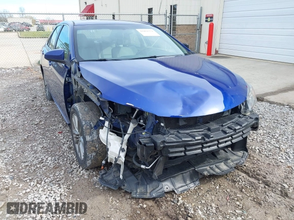 2015 Toyota Camry XLE with VIN 4T1BF1FK9FU890002, listed as a IAAI auction lot 41868372 with 283,858 mi miles. Bid and sale history available at carsss.com. Image 6.