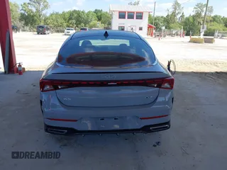 2023 Kia K5 GT-Line z VIN 5XXG64J24PG183772, wystawiony jako IAAI lot #42155447 z przebiegiem 25 313 mil mil oraz . Historia ofert i sprzedaży dostępna na DreamBid. Obrazek 17.