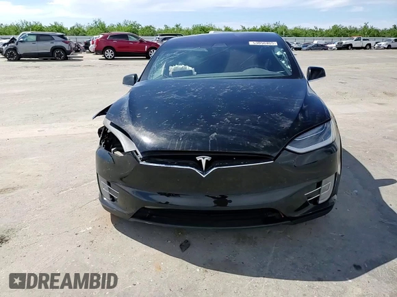 2016 Tesla Model X 70D z VIN 5YJXCDE23GF018396, wystawiony jako Copart lot #53056465 z przebiegiem 104 248 mil mil oraz Szkody całkowita. Historia ofert i sprzedaży dostępna na DreamBid. Obrazek 12.