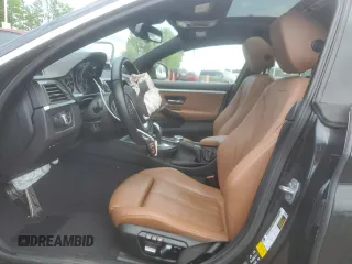 2016 BMW 4 Series 428i xDrive z VIN WBA4C9C53GG137324, wystawiony jako Copart lot #56795105 z przebiegiem 71 264 mil mil oraz Szkoda całkowita • Salvage title. Historia ofert i sprzedaży dostępna na DreamBid. Obrazek 7.