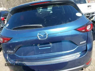 2017 Mazda CX-5 Grand Touring with VIN JM3KFADL8H0105518, listed as a IAAI auction lot 41876779 with 82,540 mi miles. Bid and sale history available at carsss.com. Image 16.