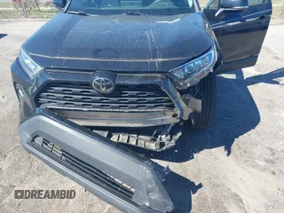 2021 Toyota RAV4 XLE with VIN 2T3W1RFV2MW107986, listed as a IAAI auction lot 41835348 with 103,450 mi miles. Bid and sale history available at carsss.com. Image 6.