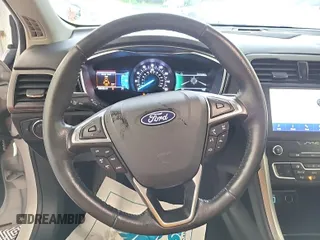 2020 Ford Fusion SEL with VIN 3FA6P0CD1LR154201, listed as a IAAI auction lot 42715761 with 99,448 mi miles and . Bid and sale history available at DreamBid. Image 29.