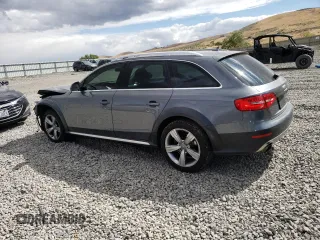2014 Audi allroad Premium Plus with VIN WA1UFAFL3EA013909, listed as a Copart auction lot 71656704 with 64,776 mi miles and Salvage Title. Bid and sale history available at carsss.com. Image 2.