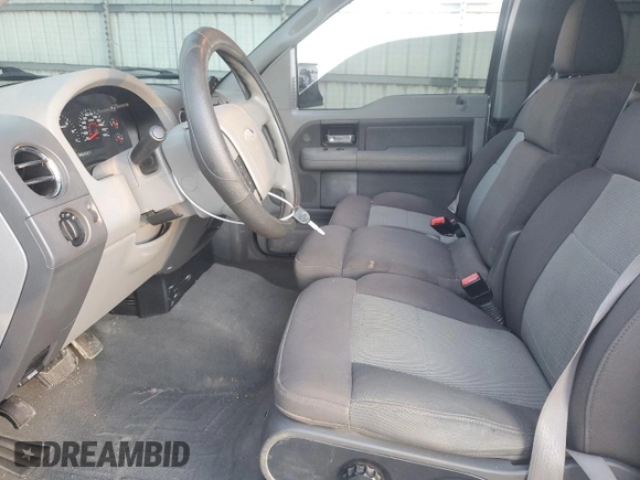 2006 Ford F-150 XLT with VIN 1FTPX04596KB93701, listed as a Copart auction lot 87672425 with 102,128 mi miles and Salvage title. Bid and sale history available at DreamBid. Image 7.