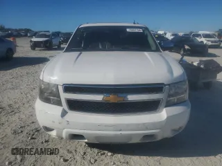 2014 Chevrolet Suburban LTZ with VIN 1GNSCKE02ER105377, listed as a Copart auction lot 76697154 with 229,461 mi miles and Salvage title. Bid and sale history available at DreamBid. Image 7.