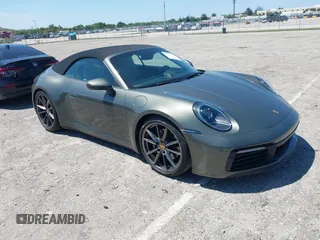 2020 Porsche 911 Carrera S with VIN WP0CB2A97LS263238, listed as a IAAI auction lot 42021346 with 23,899 mi miles. Bid and sale history available at carsss.com. Image 1.