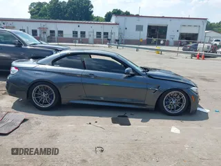 2015 BMW M4 with VIN WBS3U9C5XFJ967725, listed as a IAAI auction lot 42593444 with Not provided miles and . Bid and sale history available at DreamBid. Image 14.