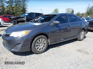 2014 Toyota Camry L with VIN 4T4BF1FK9ER423232, listed as a IAAI auction lot 41980213 with 157,132 mi miles. Bid and sale history available at carsss.com. Image 2.