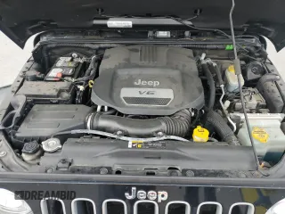 2017 Jeep Wrangler Unlimited Sahara with VIN 1C4BJWEG9HL633296, listed as a Copart auction lot 61387685 with 74,035 mi miles and Salvage title. Bid and sale history available at DreamBid. Image 11.