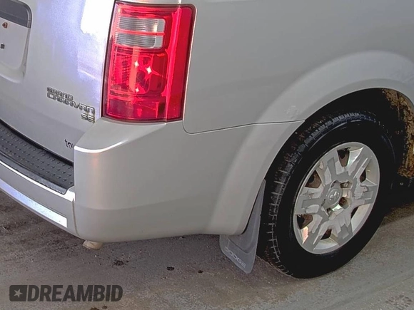 2010 Dodge Grand Caravan SE z VIN 2D4RN4DEXAR412152, wystawiony jako IAAI lot #42825395 z przebiegiem 93 398 mil mil oraz . Historia ofert i sprzedaży dostępna na DreamBid. Obrazek 14.