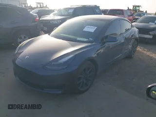 2022 Tesla Model 3 Long Range with VIN 5YJ3E1EB3NF264532, listed as a IAAI auction lot 41842044 with 42,280 mi miles and . Bid and sale history available at DreamBid. Image 2.