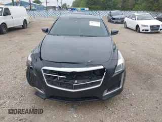 2014 Cadillac CTS Luxury AWD with VIN 1G6AX5SX9E0197395, listed as a IAAI auction lot 42211452 with 90,657 mi miles and . Bid and sale history available at DreamBid. Image 12.