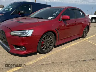 2012 Mitsubishi Lancer Evolution GSR z VIN JA32W8FV0CU019216, wystawiony jako Copart lot #75898944 z przebiegiem 129 387 mil mil oraz Tytuł czysty. Historia ofert i sprzedaży dostępna na DreamBid. Obrazek 2.