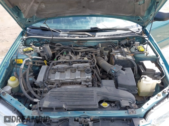 2002 Mazda Protege DX z VIN JM1BJ225721591435, wystawiony jako IAAI lot #42117544 z przebiegiem 191 185 mil mil oraz . Historia ofert i sprzedaży dostępna na DreamBid. Obrazek 10.