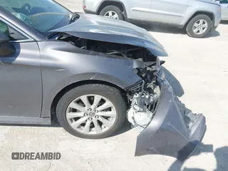 2019 Toyota Camry LE with VIN 4T1B11HK9KU810347, listed as a IAAI auction lot 41804007 with 75,063 mi miles and . Bid and sale history available at DreamBid. Image 18.
