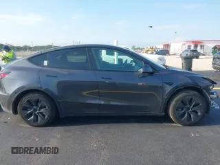 2024 Tesla Model Y with VIN 7SAYGDED3RA329355, listed as a IAAI auction lot 42343269 with 8,334 mi miles and . Bid and sale history available at DreamBid. Image 14.