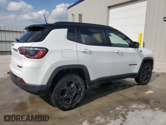 2023 Jeep Compass Trailhawk with VIN 3C4NJDDN5PT567737, listed as a Copart auction lot 61824665 with 43,843 mi miles and Clean title. Bid and sale history available at DreamBid. Image 3.