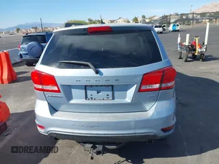2013 Dodge Journey SXT with VIN 3C4PDCBG4DT584135, listed as a IAAI auction lot 41902149 with 165,700 mi miles and . Bid and sale history available at carsss.com. Image 14.