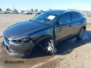 2022 Mazda CX-30 S Premium with VIN 3MVDMBDL0NM413867, listed as a IAAI auction lot 42082560 with 12,375 mi miles and . Bid and sale history available at DreamBid. Image 6.