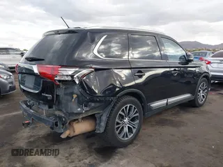 2016 Mitsubishi Outlander GT with VIN JA4JZ4AX0GZ033187, listed as a IAAI auction lot 41356040 with 100,462 mi miles and . Bid and sale history available at DreamBid. Image 4.