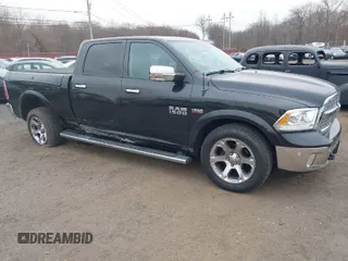 2016 Ram 1500 Laramie z VIN 1C6RR7VT9GS364870, wystawiony jako IAAI lot #41792675 z przebiegiem 114 885 mil mil oraz . Historia ofert i sprzedaży dostępna na DreamBid. Obrazek 1.