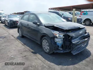 2023 Kia Rio S z VIN 3KPA24AD1PE545813, wystawiony jako IAAI lot #41939197 z przebiegiem 29 748 mil mil oraz . Historia ofert i sprzedaży dostępna na DreamBid. Obrazek 1.