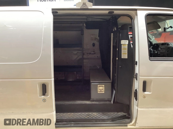 2013 Ford Econoline Cargo Commercial with VIN 1FTNE1EW9DDA61968, listed as a IAAI auction lot 42643038 with 121,719 mi miles and . Bid and sale history available at DreamBid. Image 14.