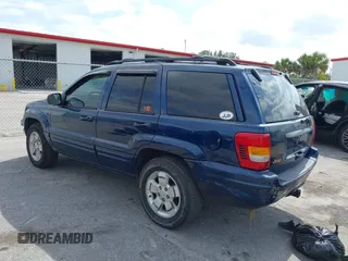 2001 Jeep Grand Cherokee Limited with VIN 1J4GX58S01C657436, listed as a IAAI auction lot 42102133 with 194,897 mi miles and . Bid and sale history available at DreamBid. Image 3.
