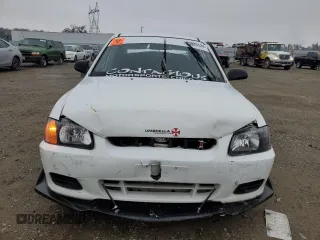 2002 Hyundai Accent GL with VIN KMHCG45C92U271388, listed as a Copart auction lot 85925124 with 98,390 mi miles and Salvage Title. Bid and sale history available at carsss.com. Image 5.