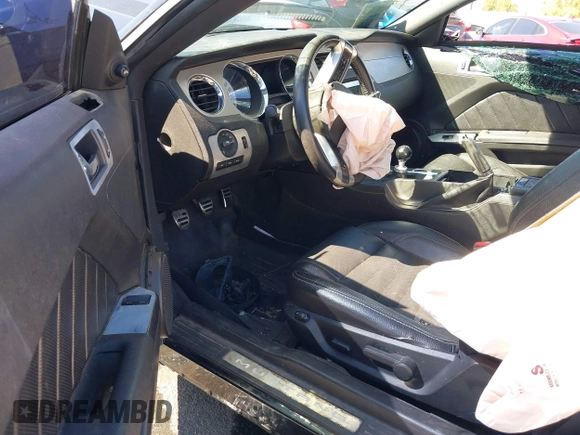 2012 Ford Mustang Premium z VIN 1ZVBP8AM8C5230247, wystawiony jako IAAI lot #41721081 z przebiegiem 118 868 mil mil oraz . Historia ofert i sprzedaży dostępna na DreamBid. Obrazek 5.