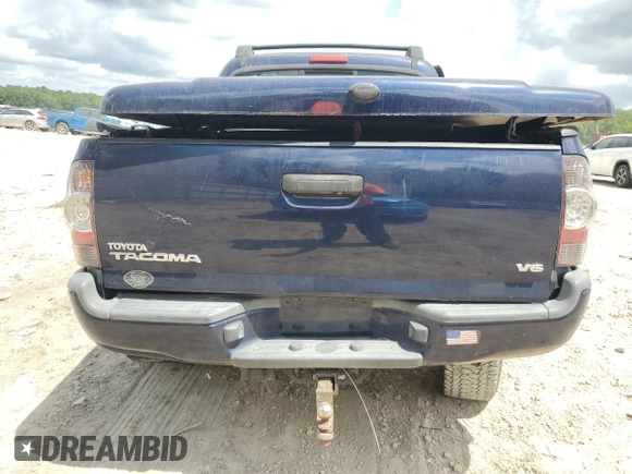2013 Toyota Tacoma with VIN 3TMLU4EN4DM130721, listed as a Copart auction lot 55943445 with 126,566 mi miles and Salvage title. Bid and sale history available at DreamBid. Image 6.
