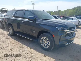 2021 Chevrolet Tahoe LT z VIN 1GNSKNKD4MR250981, wystawiony jako IAAI lot #42092550 z przebiegiem 89 414 mil mil oraz . Historia ofert i sprzedaży dostępna na DreamBid. Obrazek 1.
