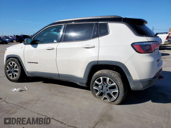 2020 Jeep Compass Trailhawk with VIN 3C4NJDDB7LT118561, listed as a Copart auction lot 46740025 with 61,286 mi miles and Salvage Title. Bid and sale history available at carsss.com. Image 2.