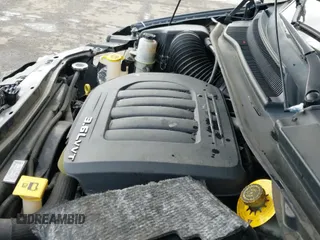 2014 Dodge Grand Caravan SE 30th Anniversary with VIN 2C4RDGBG5ER187800, listed as a IAAI auction lot 41785046 with 59,348 mi miles and . Bid and sale history available at DreamBid. Image 18.