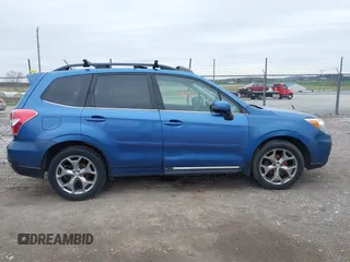 2015 Subaru Forester 2.5i Touring with VIN JF2SJAWC9FH415634, listed as a IAAI auction lot 41954673 with 140,507 mi miles. Bid and sale history available at carsss.com. Image 12.