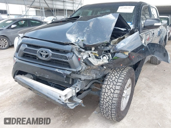 2013 Toyota Tacoma PreRunner with VIN 5TFJU4GNXDX034431, listed as a IAAI auction lot 42201207 with 195,679 mi miles and . Bid and sale history available at DreamBid. Image 6.