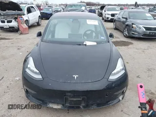 2018 Tesla Model 3 Long Range Battery with VIN 5YJ3E1EB9JF188437, listed as a IAAI auction lot 41371254 with 55,934 mi miles and . Bid and sale history available at DreamBid. Image 12.