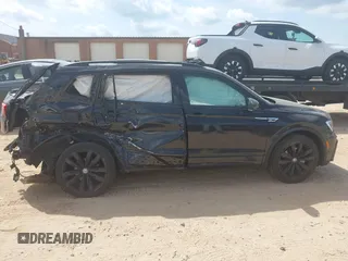2021 Volkswagen Tiguan SE z VIN 3VV3B7AX5MM027369, wystawiony jako IAAI lot #42082821 z przebiegiem 74 024 mil mil oraz . Historia ofert i sprzedaży dostępna na DreamBid. Obrazek 13.