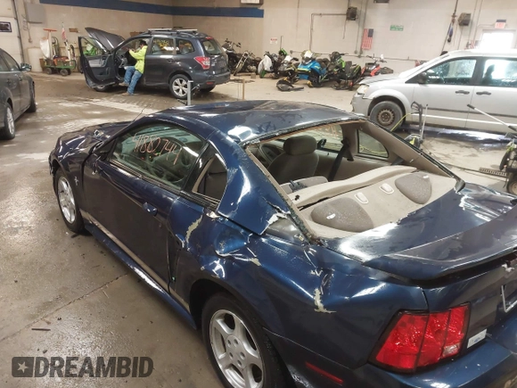 2002 Ford Mustang Standard z VIN 1FAFP40452F117630, wystawiony jako IAAI lot #41882744 z przebiegiem 85 218 mil mil oraz . Historia ofert i sprzedaży dostępna na DreamBid. Obrazek 6.