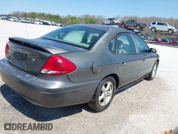 2004 Ford Taurus SE with VIN 1FAFP53U04A119254, listed as a IAAI auction lot 41871190 with 97,187 mi miles and . Bid and sale history available at DreamBid. Image 4.