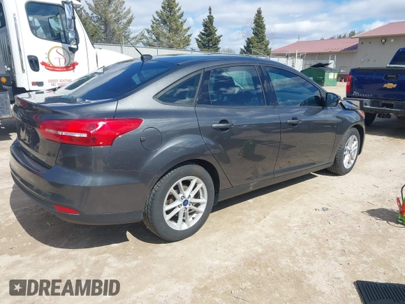 2018 Ford Focus SE with VIN 1FADP3F26JL249433, listed as a IAAI auction lot 41871395 with 131,357 mi miles. Bid and sale history available at carsss.com. Image 4.