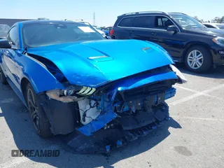 2021 Ford Mustang EcoBoost with VIN 1FA6P8TH0M5119073, listed as a IAAI auction lot 42225499 with 52,165 mi miles and . Bid and sale history available at DreamBid. Image 6.