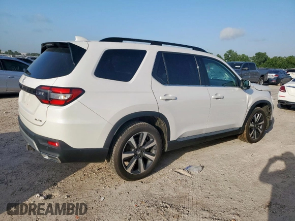 2023 Honda Pilot Elite z VIN 5FNYG1H86PB030033, wystawiony jako Copart lot #61843035 z przebiegiem 48 511 mil mil oraz Szkoda całkowita • Salvage title. Historia ofert i sprzedaży dostępna na DreamBid. Obrazek 3.