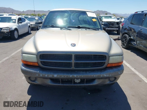 2002 Dodge Dakota with VIN 1B7FL16X72S642881, listed as a IAAI auction lot 42153560 with 220,917 mi miles and . Bid and sale history available at carsss.com. Image 6.