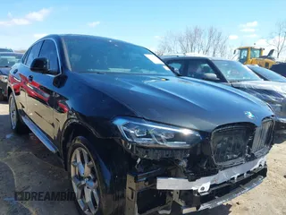 2022 BMW X4 xDrive30i z VIN 5UX33DT08N9M99042, wystawiony jako IAAI lot #42032331 z przebiegiem 34 363 mil mil oraz . Historia ofert i sprzedaży dostępna na DreamBid. Obrazek 1.