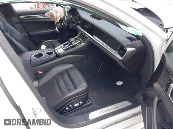 2018 Porsche Panamera 4 E-Hybrid with VIN WP0AE2A74JL130540, listed as a IAAI auction lot 42078444 with 65,981 mi miles and . Bid and sale history available at DreamBid. Image 5.