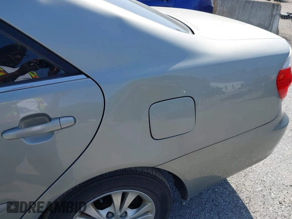 2005 Toyota Camry LE with VIN 4T1BF32KX5U610667, listed as a IAAI auction lot 42132769 with Not Provided miles and . Bid and sale history available at DreamBid. Image 6.
