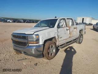 2016 Chevrolet Silverado 1500 LT with VIN 3GCUKREC8GG112179, listed as a IAAI auction lot 40848430 with 215,739 mi miles. Bid and sale history available at carsss.com. Image 2.
